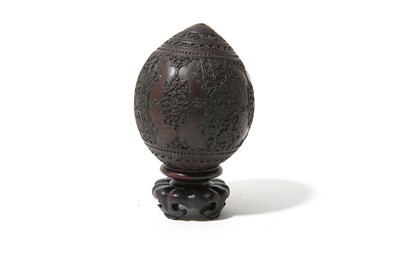 Lot 356 - A SAFAVID-STYLE CARVED INDIAN YOUNG COCONUT...