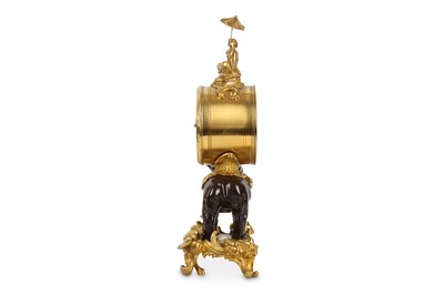 Lot 16 - A LOUIS XV STYLE GILT AND PATINATED BRONZE...