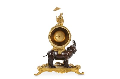 Lot 16 - A LOUIS XV STYLE GILT AND PATINATED BRONZE...