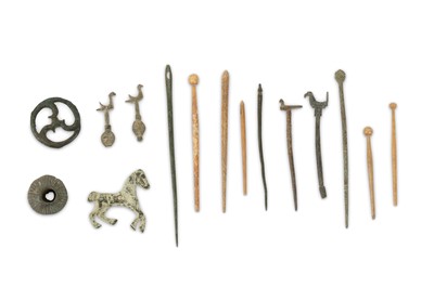 Lot 120 - A GROUP OF ROMAN BONE AND BRONZE PIECES...