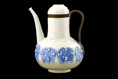 Lot 222 - A SAFAVID BLUE AND WHITE GOMBROON POTTERY EWER...