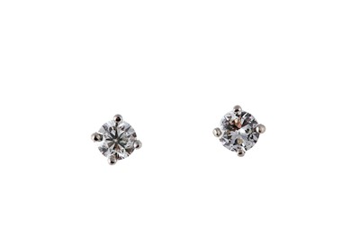 Lot 142 - A pair of diamond earstuds Each brilliant-cut...