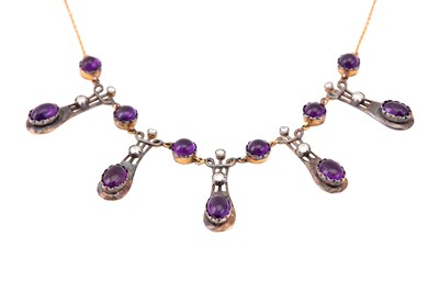 Lot 606 - An amethyst and diamond necklace, of...