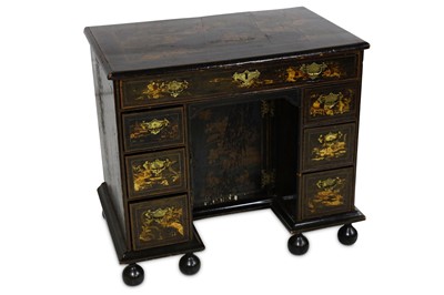 Lot 777 - A Georgian Chinoiserie kneehole desk, with a...