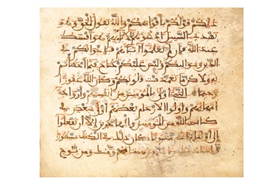 Lot 7 - A LOOSE FOLIO FROM A MAGHRIBI QUR’AN North...