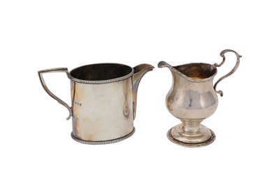 Lot 56 - Two sterling silver cream or milk jugs, one...