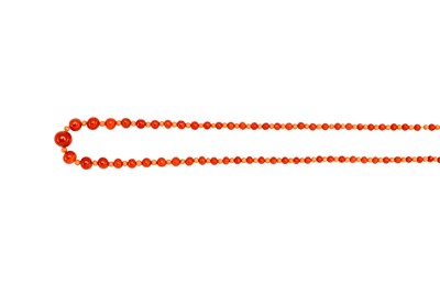 Lot 49 - A coral bead necklace The single strand of 4.5-...