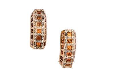 Lot 105 - A pair of citrine and diamond earclips Each...