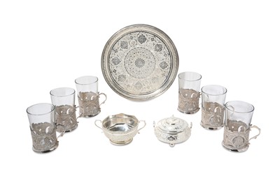 Lot 286 - A MATCHED SILVER TEA SET  Iran, 20th century, ...