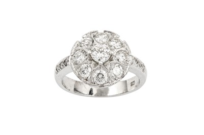 Lot 158 - A diamond dress ring Of cluster design, set...