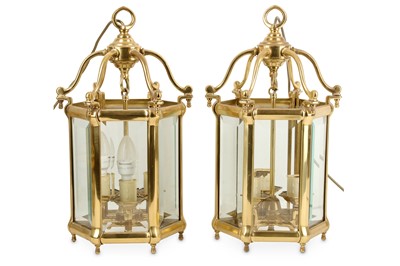 Lot 721 - Two brass lantern hanging lamps, each of...