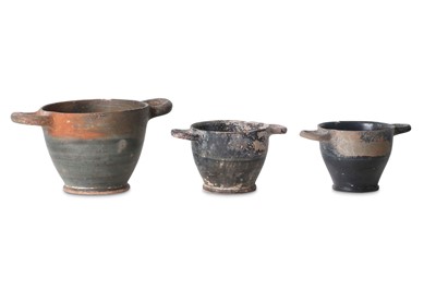 Lot 63 - THREE BLACK GLAZED SKYPHOI Circa 4th - 1st...