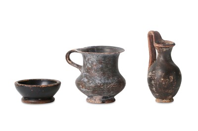 Lot 62 - THREE BLACK GLAZED VESSELS Circa 4th - 1st...