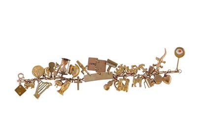 Lot 233 - A charm bracelet The paper-link chain...