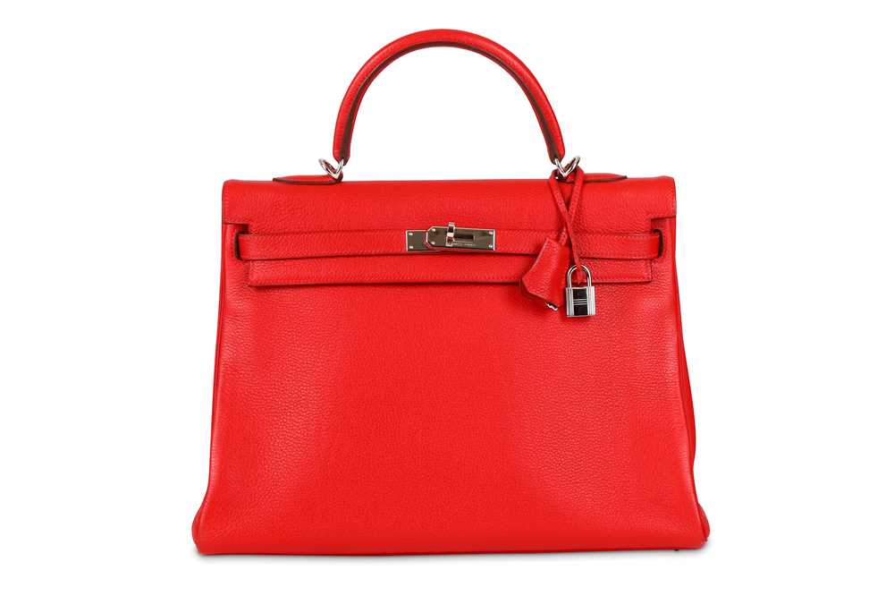 Lot 242 - Hermès Red Taurillon Clemence Retourne Kelly...