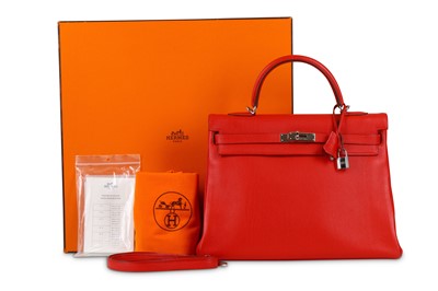 Lot 242 - Hermès Red Taurillon Clemence Retourne Kelly...