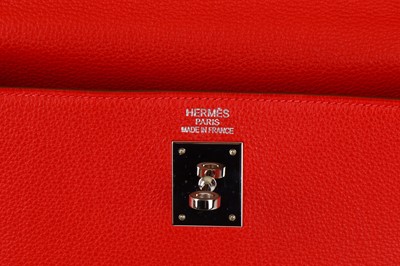 Lot 242 - Hermès Red Taurillon Clemence Retourne Kelly...