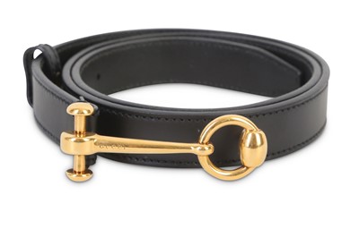 Lot 47 - Gucci Black Leather Belt, gold tone Horsebit...