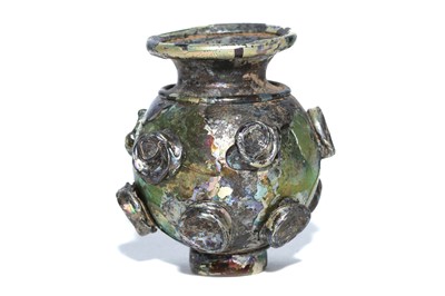 Lot 171 - A SASSANIAN ‘BUTTON’ GLASS VESSEL  Circa 3rd –...