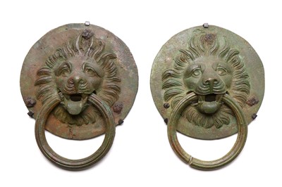 Lot 111 - A PAIR OF ROMAN BRONZE LION COFFER HANDLES...