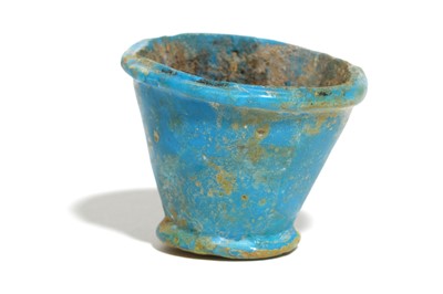 Lot 30 - AN EGYPTIAN BLUE GLASS VESSEL Late Period,...