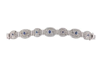 Lot 174 - A sapphire and diamond bracelet Formed as a...