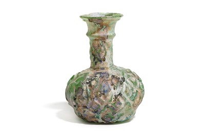 Lot 180 - AN ISLAMIC GLASS FLASK Circa 9th - 12th...