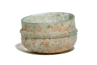 Lot 168 - A ROMAN PALE BLUE GLASS BOWL Circa 2nd - 4th...