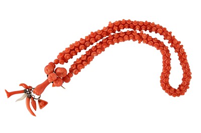 Lot 43 - A mid 19th century carved coral necklace The...