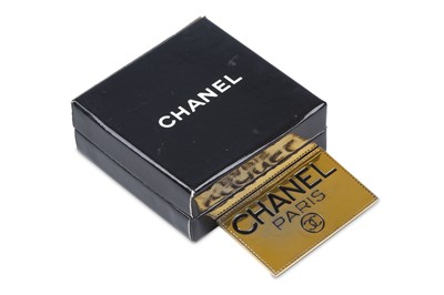 Lot 74 - Chanel Vintage Name Tag Brooch, gold tone with...