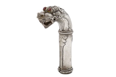 Lot 318 - A SILVER HANDLE IN THE FORM OF A YALI PROPERTY...