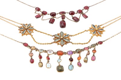 Lot 621 - A group of three gem-set necklaces, Including...