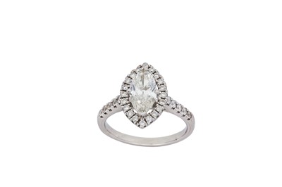 Lot 221 - A diamond cluster ring Centred by a...