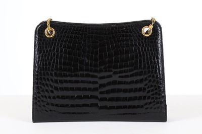 Lot 81 - Gucci Vintage Black Crocodile Handbag, gold...