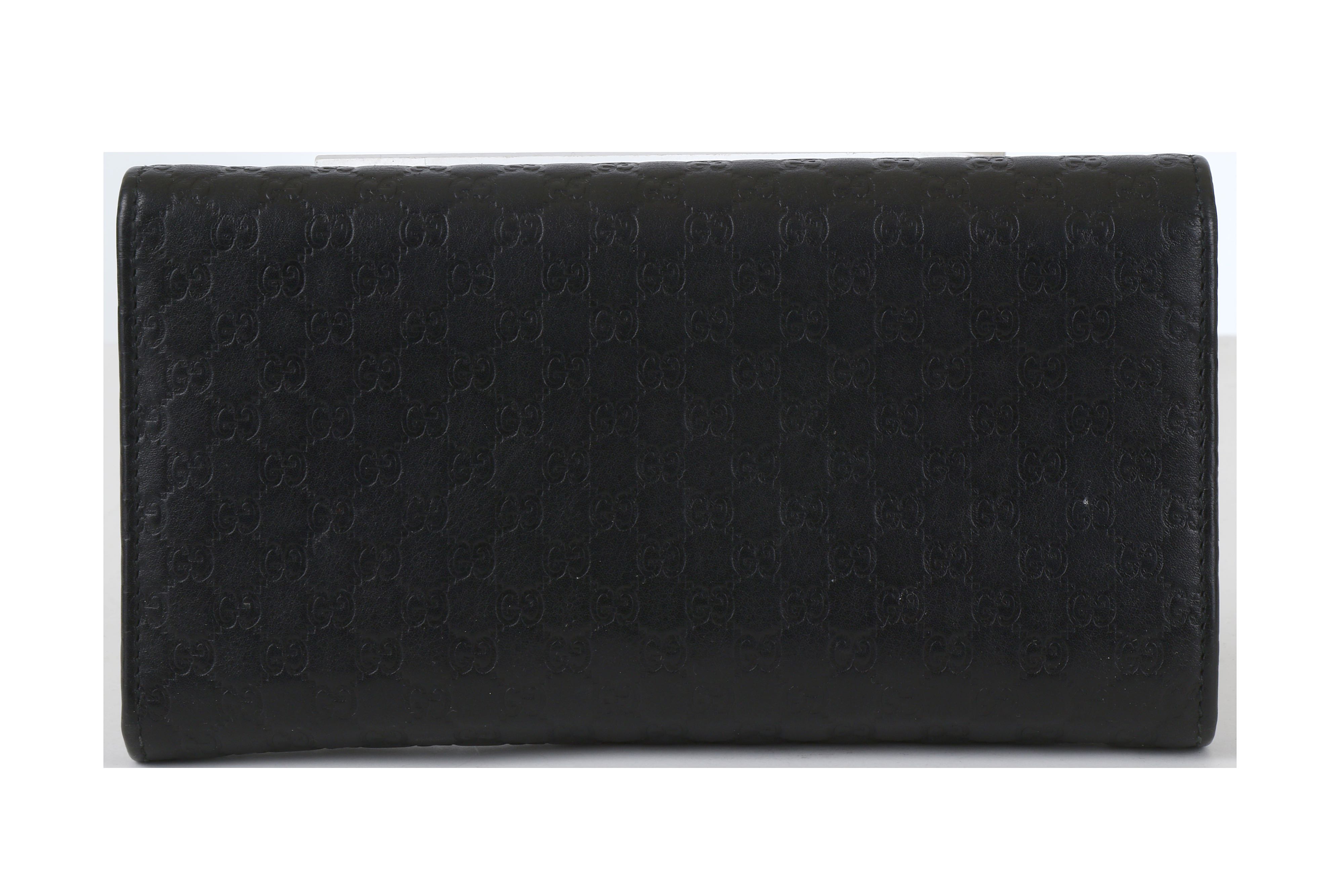 Lot 134 - Gucci Black Guccissima Wallet, embossed logo