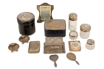 Lot 663 - A collection of silver items decorated with...