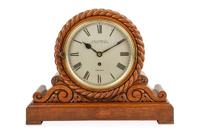 Lot 712 - An early Victorian oak case mantle clock, the...