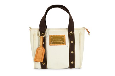 Lot 42 - Louis Vuitton Cream Antigua Cabas PM, c. 2005,...