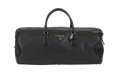 Lot 37 - Prada Black Saffiano Duffel Bag, silver tone...