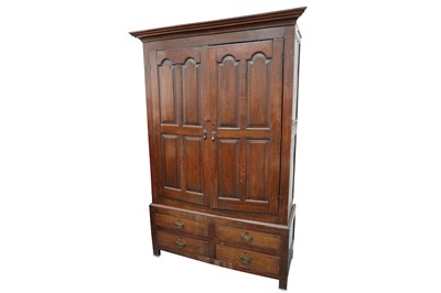 Lot 801 - An 18th Century oak armoire, the panelled...