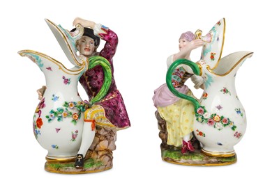 Lot 6 - A pair of Meissen Porcelain figural ewers,...