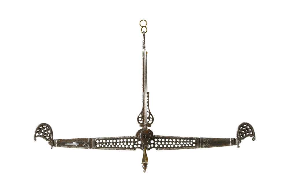 Lot 239 - *A PIERCED STEEL BALANCE ARM PROPERTY FROM