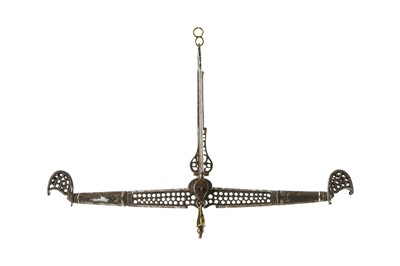 Lot 239 - *A PIERCED STEEL BALANCE ARM PROPERTY FROM AN...