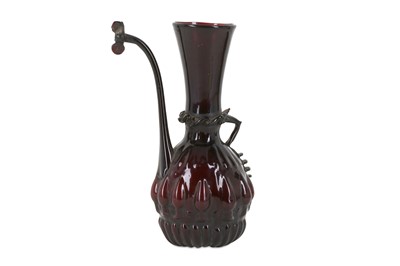 Lot 250 - * A QAJAR AUBERGINE GLASS EWER  PROPERTY FROM...