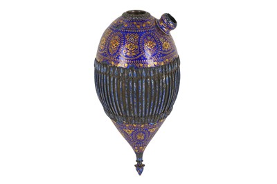 Lot 255 - *A QAJAR GILT AND BLUE ENAMELLED SILVER...