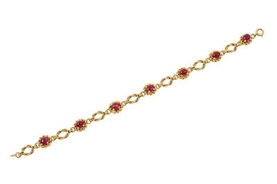 Lot 41 - A ruby bracelet, circa 1955 Designed as an...