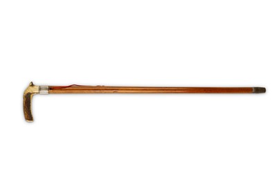 Lot 86 - Two antique walking sticks. An English stick...