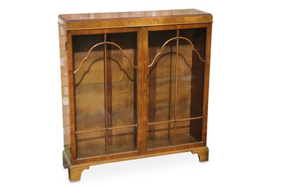 Lot 817 - A walnut glazed display cabinet, together with...