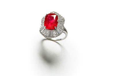 Lot 270 - A ruby and diamond cluster ring The...