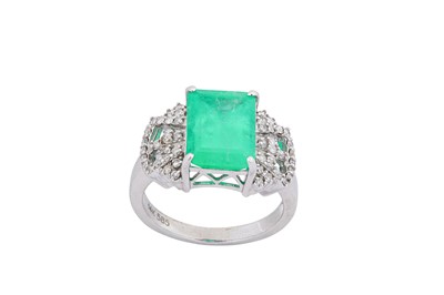 Lot 167 - An emerald and diamond ring The octagonal step-...